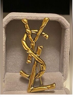 Yves Saint Laurent Sculpted Antique Gold Tone Logo Brooch Unisex